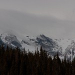 Navajo and Apache Peaks in the clouds