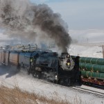 UP 844 steaming east at Archer. The old Northern 4-8-4 was built in 1944, and looking good!