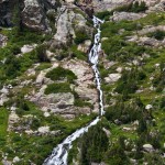 Steep cascade of water feeds Loch Lomond from lakes above.