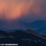 Sunset and rain shower on South Park from Red Mountain